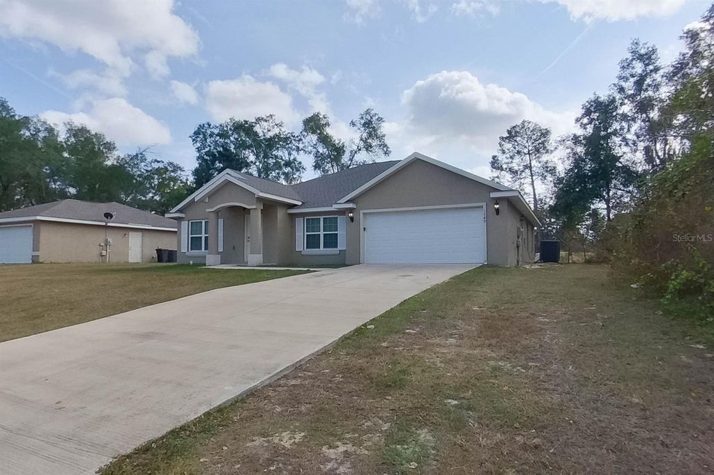 Photo of 1749 SW 168th Loop, Ocala, FL 34473 (MLS # O6373336)