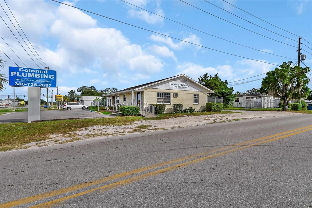 Photo of 1319 S Woodland Boulevard, Deland, FL 32720 (MLS # V4939472)