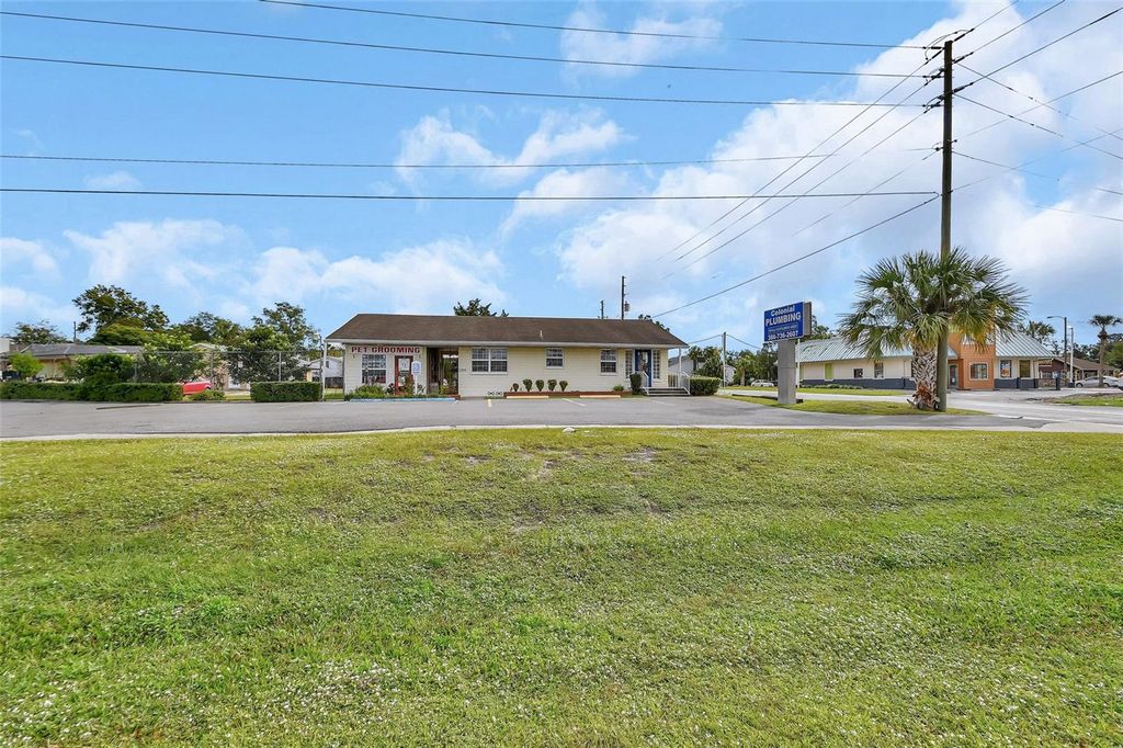 Photo of 1319 S Woodland Boulevard, Deland, FL 32720 (MLS # V4939472)