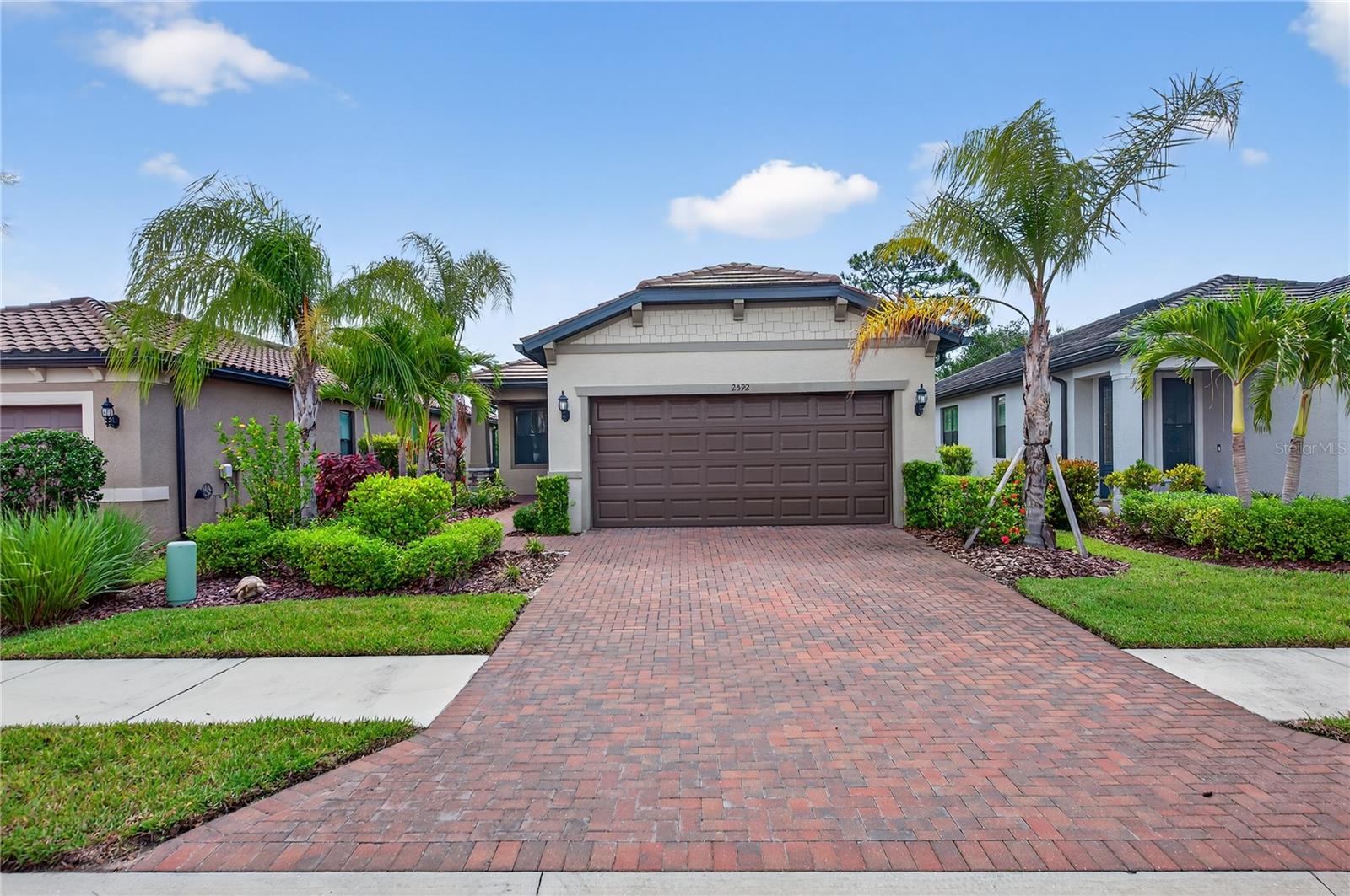 Welcome to your dream home—completely turnkey and ready for you!
Nestled in the highly desirable Cypress Falls at The Woodlands, a 55+ gated community, this home offers comfort, style, and vibrant living. The property boasts excellent curb appeal, framed by lush, mature landscaping.
Step inside to discover a flexible bonus room to your left—perfect for a home office, den, or reading nook. Beyond lies a beautifully appointed kitchen, ideal for the culinary enthusiast, featuring modern finishes and a thoughtful layout. The open-concept living and dining areas provide a spacious, inviting atmosphere—perfect for hosting friends and family.
Guests will enjoy a generously sized bedroom with a large closet, conveniently located next to a full guest bathroom complete with a soaking tub. The expansive primary suite offers a private retreat, featuring a spa-like en-suite with a frameless glass shower and an oversized walk-in closet.
Step outside to your lanai oasis—a partially covered, screened-in space with nearly 300 sq. ft. of outdoor living. Enjoy peaceful views of the large pond while sipping your morning coffee, reading a book, or simply relaxing in the Florida breeze.
Beyond your doorstep, Cypress Falls offers an exceptional lifestyle with a wide range of amenities: a stunning clubhouse, resort-style pools, a fitness center, tennis and pickleball courts, bocce, horseshoes, and a full calendar of social events. With a full-time activities director and numerous clubs, you're not just purchasing a home—you're joining a vibrant, active community.
Come see for yourself what makes this home and neighborhood truly exceptional!