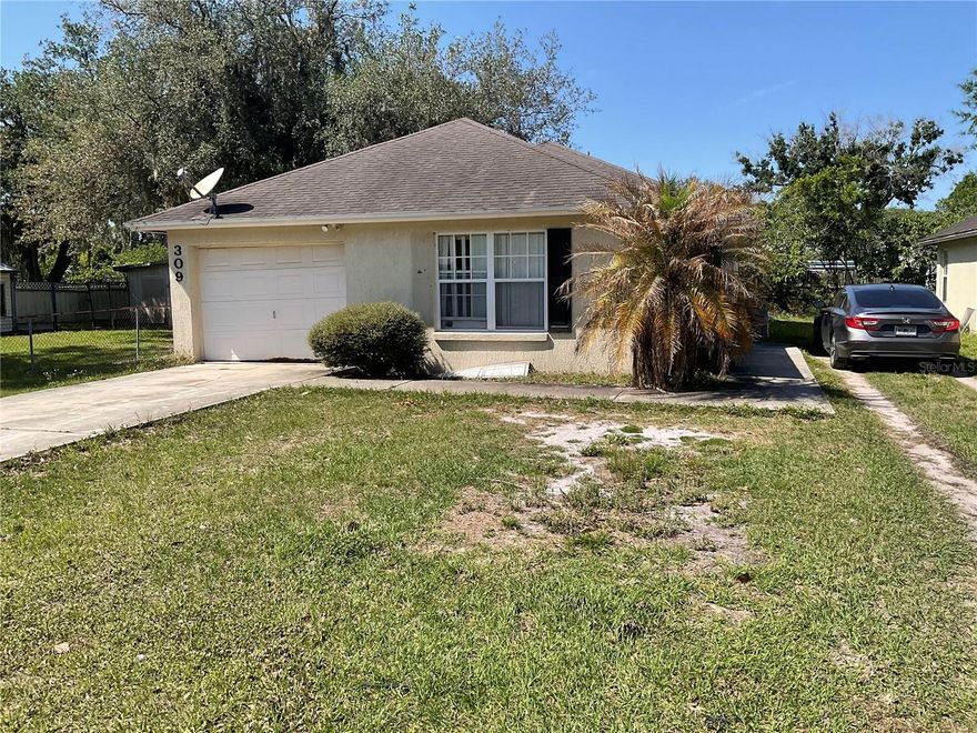 This 3-bedroom, 2-bath home located at 309 NW 9th St in Mulberry offers a prime opportunity for renovation and value-add potential. Situated on a quiet residential street, this property is perfect for buyers looking to customize or investors seeking their next project. 
The home features a functional layout with three bedrooms and two full bathrooms, providing a solid foundation for updates and improvements. Significant repairs and renovations are needed, making this a true fixer-upper with endless possibilities. Conveniently located near schools, shopping, and major roadways, this property offers both potential and accessibility. Bring your vision and transform this diamond in the rough into a beautiful residence or profitable investment.