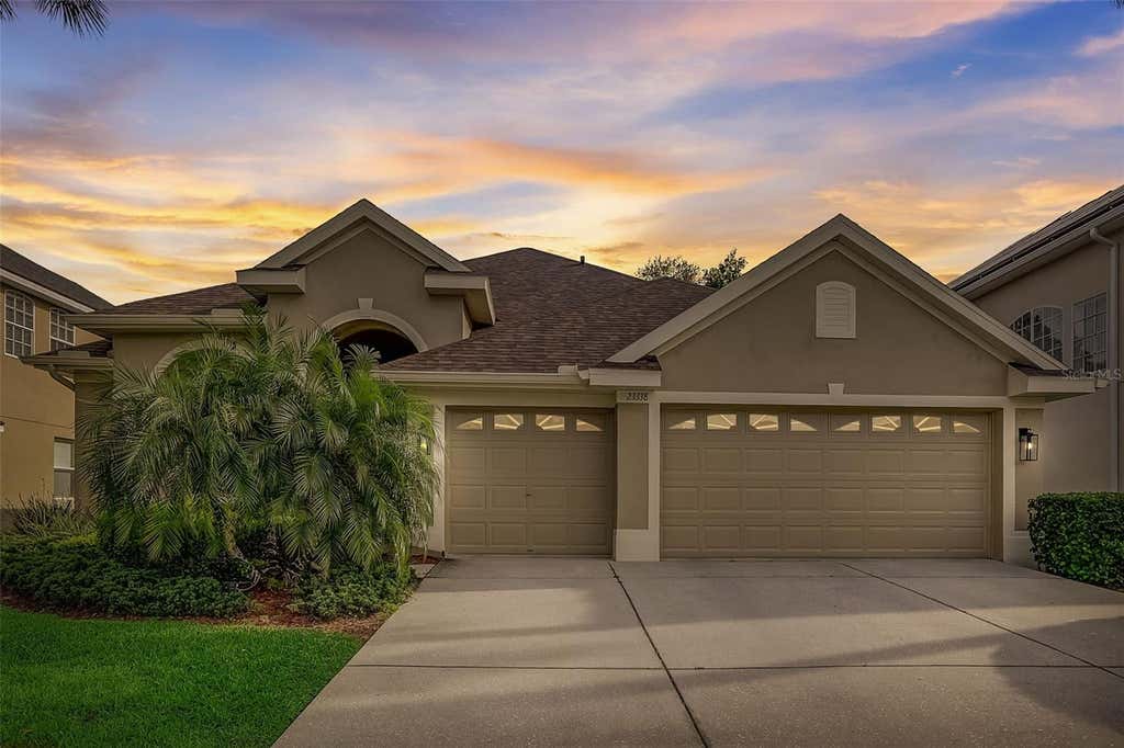 Photo of 23338 Dinhurst Court, Land O Lakes, FL 34639 (MLS # TB8520093)