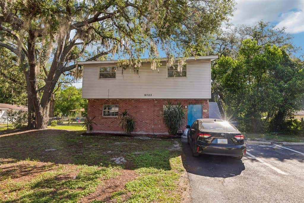 Photo of 9703 N 14th Street, Tampa, FL 33612 (MLS # TB8508791)