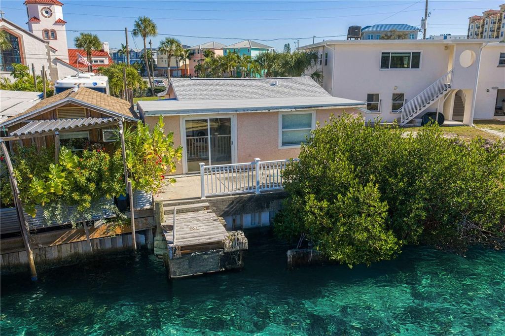 Photo of 50 137th Avenue Circle, Madeira Beach, FL 33708 (MLS # TB8456428)