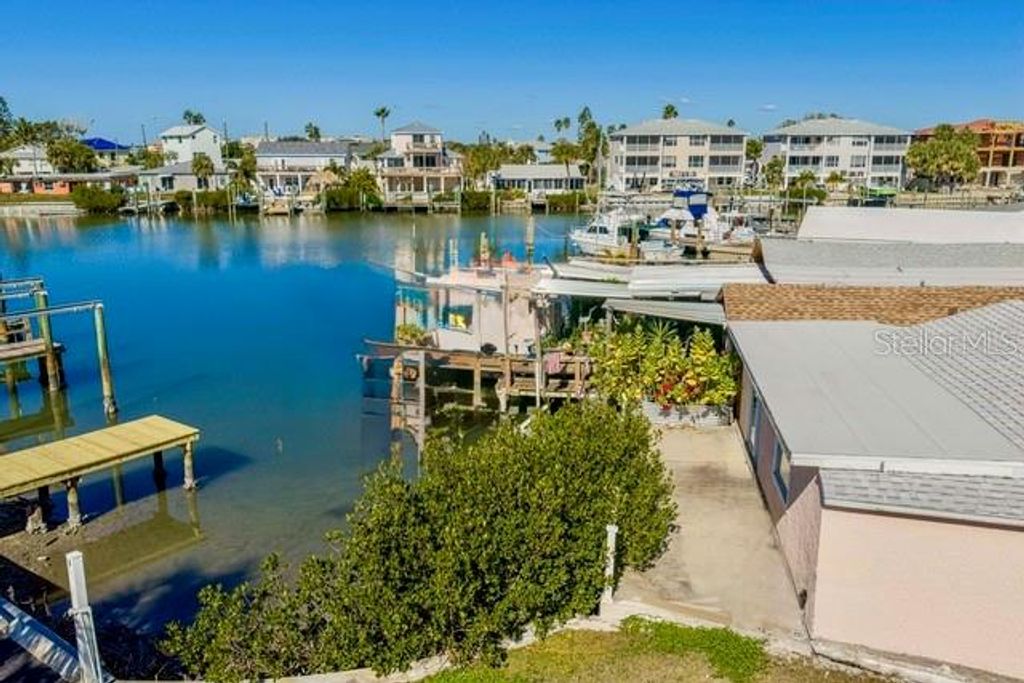 Photo of 50 137th Avenue Circle, Madeira Beach, FL 33708 (MLS # TB8456428)