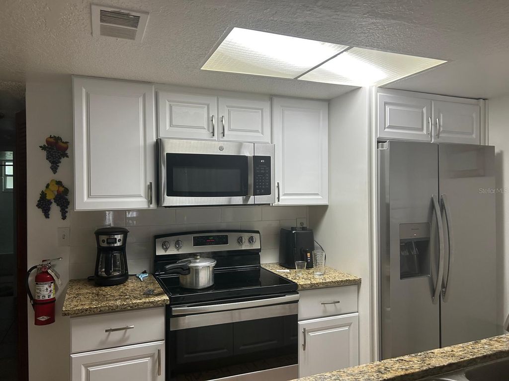 Photo of 2739 N Poinciana Boulevard #71, Kissimmee, FL 34746 (MLS # O6409625)