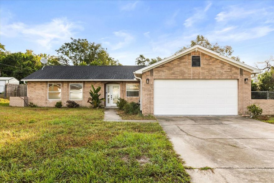 One or more photo(s) has been virtually staged. Welcome to this spacious home in a peaceful Deltona neighborhood! Featuring an open floor plan with beautiful wood-look flooring, neutral colors, and a cozy fireplace, this home offers the perfect blend of comfort and functionality. The kitchen includes granite countertops, dark cabinetry, and ample counter space, ideal for everyday cooking and entertaining.

Enjoy a split bedroom layout for added privacy, bright interiors, and a screened-in pool area perfect for relaxing or hosting gatherings. Conveniently located near schools, parks, shopping, and major highways, this home provides both comfort and convenience in one great package.