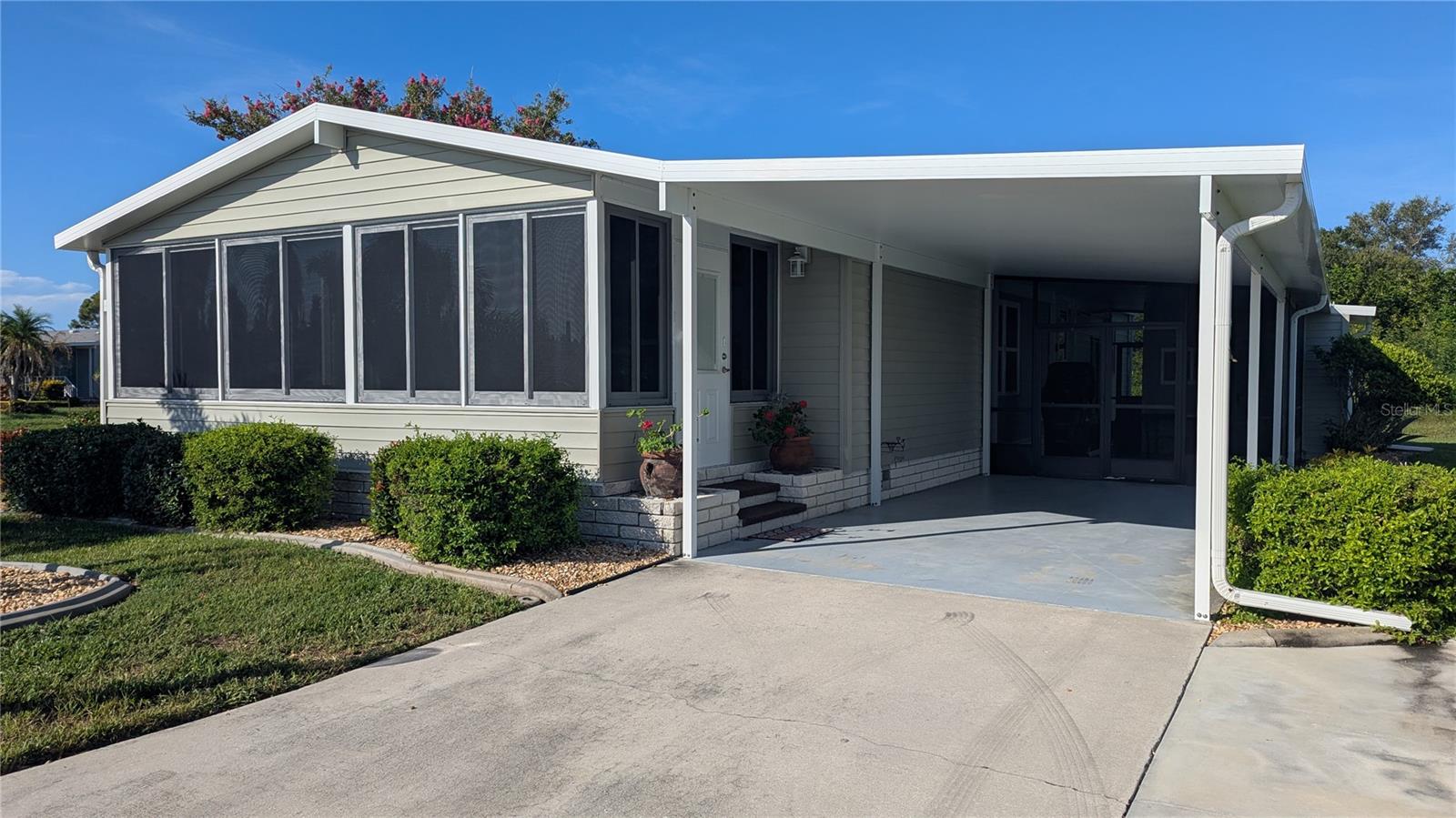 Experience Serene 55+ Living in Tangerine Woods!
Welcome to your turn-key slice of paradise at 706 Watersedge St, located in the highly sought-after 55+ community of Tangerine Woods in Englewood, FL. This meticulously maintained 2-bedroom, 2-bathroom modular home offers the ultimate blend of comfort, convenience, and vibrant community living, all in a prime Southwest Florida location.
Move-In Ready & Beautifully Updated:
Step inside and instantly feel at home! This charming residence comes fully furnished, making your move to Florida effortless. Enjoy peace of mind with recent significant upgrades including new windows and doors throughout, enhancing energy efficiency and curb appeal, and a brand-new roof providing years of worry-free living. The exterior boasts a well-maintained landscape, nurtured by an efficient irrigation system. Perfectly positioned on a desirable corner lot with tranquil woods behind, you'll relish the added privacy and serene natural views. Plus, for your peace of mind, the property is located in Flood Zone X, typically indicating a lower flood risk.
Unbeatable Community Amenities & Lifestyle:
Tangerine Woods is renowned for its active and welcoming atmosphere, catering to a diverse range of interests. As a resident, you'll have access to an impressive array of amenities:
Sparkling Heated Swimming Pool and Relaxing Hot Tub – perfect for a dip or unwinding year-round.
Lighted Tennis Courts for friendly matches or competitive play.
Shuffleboard Courts for classic Florida fun.
A picturesque Community Pond, ideal for peaceful strolls or bird watching.
A spacious Community Center with a Stage – the hub for social gatherings, events, and entertainment.
The entire community is golf cart friendly, making it easy and fun to navigate to amenities or visit neighbors.
Exceptional Value with Comprehensive HOA:
The HOA fees are incredibly comprehensive, offering remarkable value and simplifying your budget. They include essential services such as:
High-speed internet
Cable TV
Maintenance of all common areas and amenities.
Road maintenance within the community.
Tangerine Woods is celebrated for its active social calendar, offering residents numerous opportunities to engage in clubs, activities, and events, fostering a true sense of community. Its convenient Englewood location provides easy access to pristine Gulf beaches, charming downtown shops and restaurants, medical facilities, and championship golf courses.
Don't miss this opportunity to embrace the quintessential Southwest Florida 55+ lifestyle. Schedule your private showing today and discover all that 706 Watersedge St and Tangerine Woods has to give!