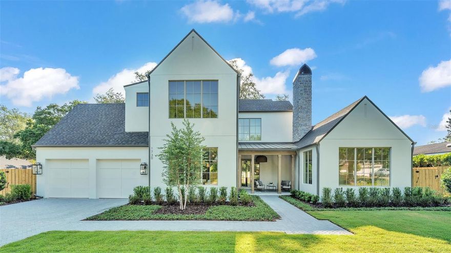 Welcome to this exquisite 5-bedroom, 5.5-bathroom home built by Lundev, perfectly situated in the highly sought-after Timberlane Shores neighborhood of Winter Park. Spanning 4,080 square feet, this property offers the ultimate blend of luxury and comfort. Thoughtfully designed for both entertaining and everyday living, this home features high-end finishes and top-quality craftsmanship throughout.

Upon entering, you're greeted by a charming front porch with a cozy fireplace, setting the tone for the warmth and elegance that continues inside. This inviting outdoor space is perfect for relaxing with a morning coffee or enjoying cool evenings with friends and family. Step inside to find a spacious great room, ideal for gathering and entertaining, boasting ample natural light and a seamless flow to the rest of the home’s main living areas.

The gourmet kitchen is a chef’s dream, boasting high-quality appliances, a wine cooler, refrigerator drawers, and a casual café area for everyday dining. The adjacent formal dining room offers a sophisticated space for hosting elegant dinner parties and holiday gatherings. These thoughtfully designed spaces ensure that every meal and event is special.

The luxurious primary suite is conveniently located on the first floor, providing a tranquil retreat with easy access. It features a spa-like bathroom with double sinks, a soaking tub, a shower, a linen closet, and a large walk-in wardrobe for ample storage. Additionally, on the main floor you will also find a detached bedroom or office with an en-suite bathroom, built-in closet, and private entrance offering flexibility and making it ideal for guests or as a private workspace.

Upstairs, you’ll find three aditional bedrooms, each featuring its own en-suite bathroom and walk-in closet, providing comfort and privacy for all occupants. A versatile loft/den area on the second floor adds extra living space, perfect for a home office, playroom, or relaxation area, catering to various lifestyle needs.

The outdoor area is an entertainer's paradise, complete with a private pool & spa, a cabana with a pleasant fireplace, and a summer kitchen for alfresco dining and entertaining. Whether hosting a barbecue or enjoying a quiet afternoon by the pool, this space is designed for relaxation and enjoyment. With its great location, this home offers excellent proximity to Blue Jacket Park, Baldwin Park, and the vibrant Park Avenue, known for its entertainment options, shops, and restaurants. Experience luxury living in one of Winter Park's most coveted areas. Schedule your private tour today to see this stunning property in person!