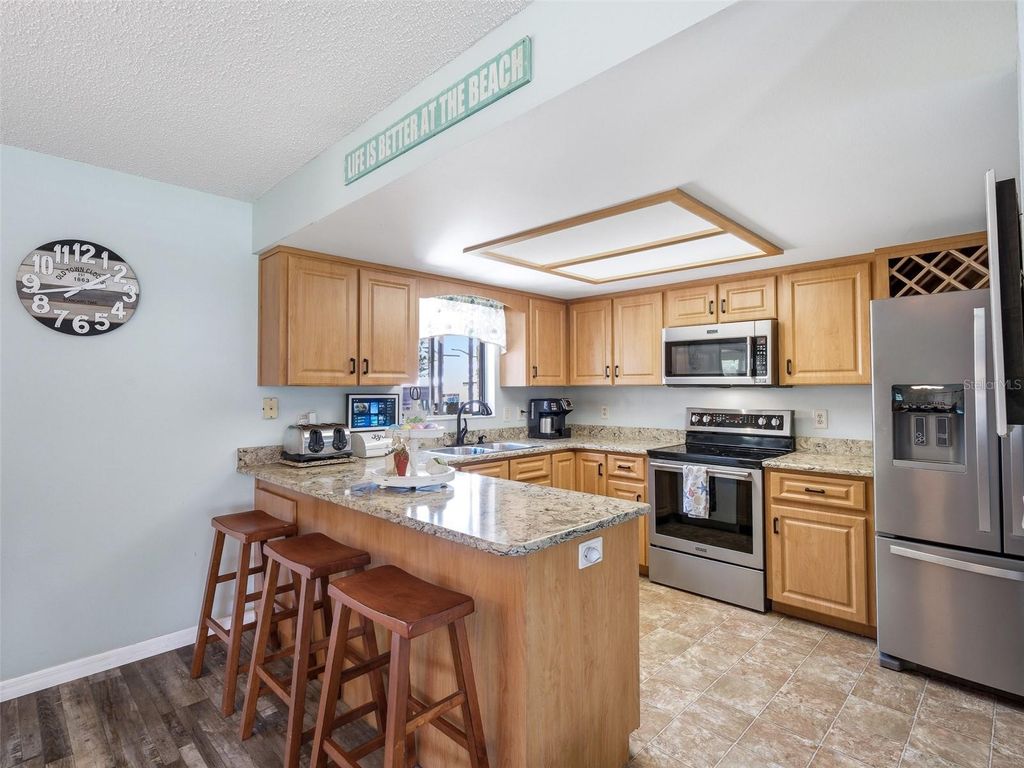 Photo of 1915 Kumquat Drive, Edgewater, FL 32141 (MLS # NS1087817)