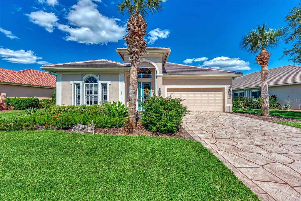 Photo of 13335 Golf Pointe Drive, Port Charlotte, FL 33953 (MLS # D6149029)
