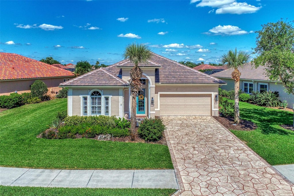 Photo of 13335 Golf Pointe Drive, Port Charlotte, FL 33953 (MLS # D6149029)