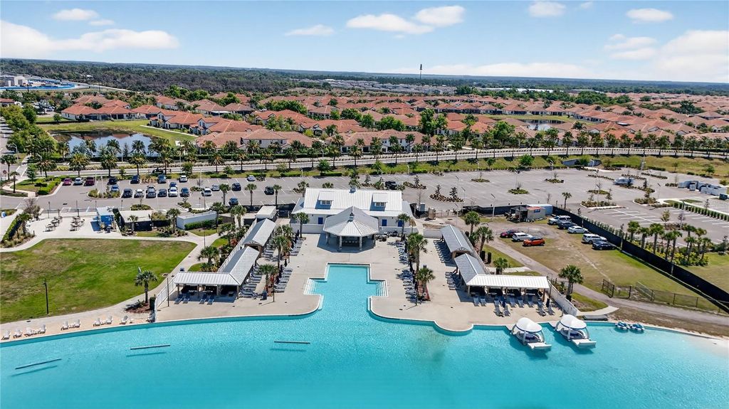 Photo of 16632 Grotto Steam Place, Wimauma, FL 33598 (MLS # A4687596)