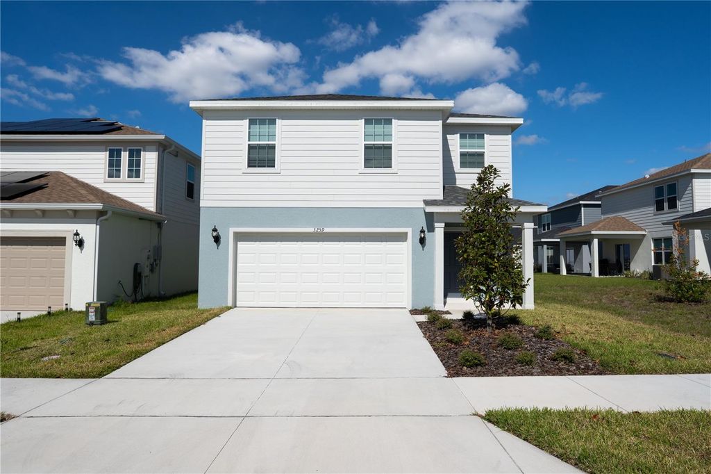 Photo of 3259 Ellsworth Ave, Davenport, FL 33837 (MLS # O6357349)