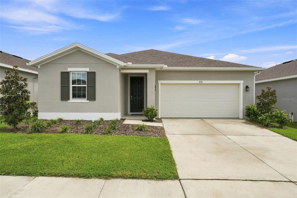 Photo of 1530 Sugarbelle Circle, Mascotte, FL 34753 (MLS # G5117477)