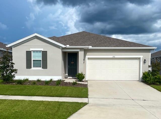 Photo of 1530 Sugarbelle Circle, Mascotte, FL 34753 (MLS # G5117477)