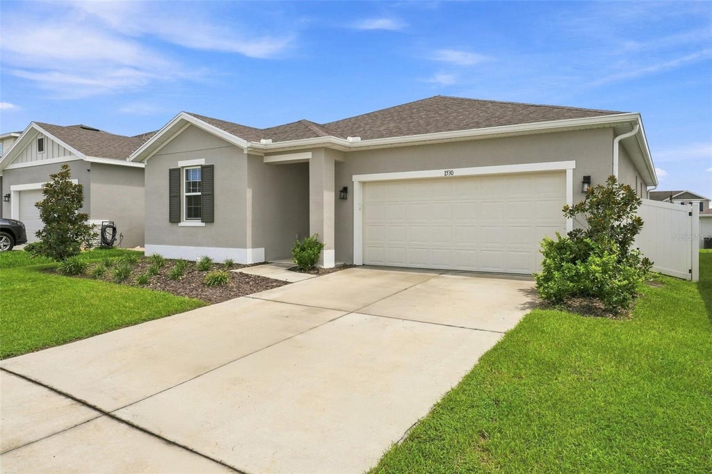 Photo of 1530 Sugarbelle Circle, Mascotte, FL 34753 (MLS # G5117477)