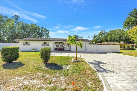 Photo of 13216 Forest Hills Drive, Tampa, FL 33612 (MLS # TB8451367)