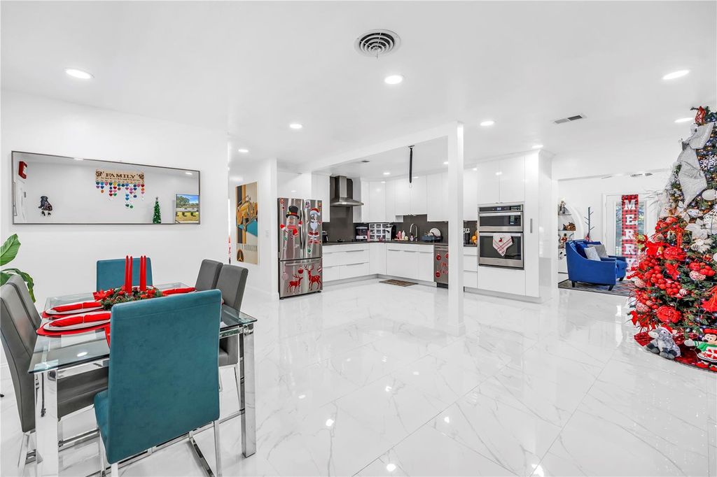 Photo of 13216 Forest Hills Drive, Tampa, FL 33612 (MLS # TB8451367)