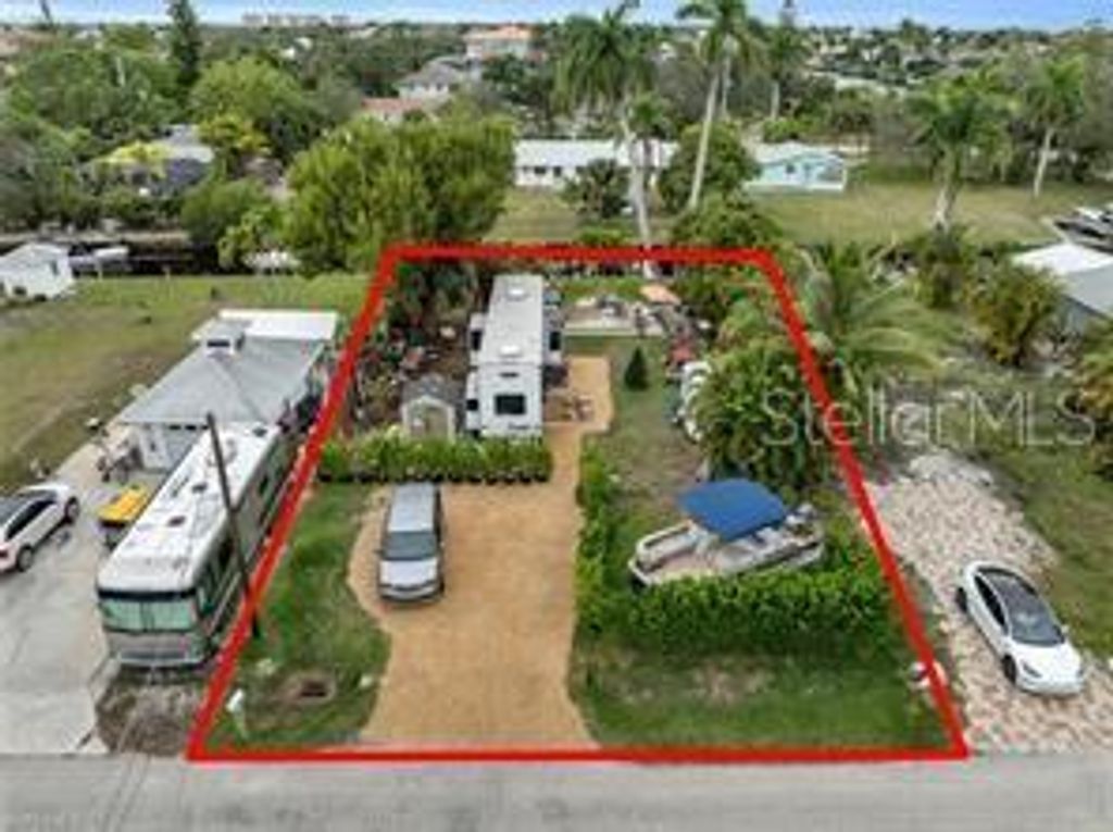 Photo of 27579 Tarpon Way, Bonita Springs, FL 34134 (MLS # C7516000)