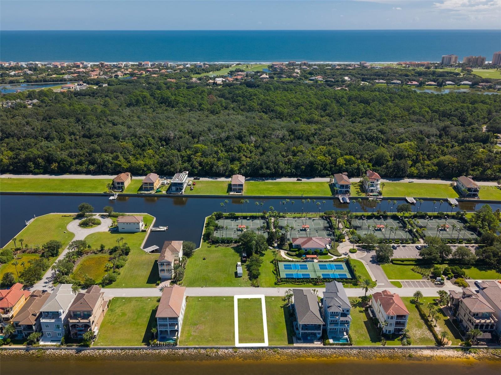 LOWEST PRICED INTRACOASTAL HOMESITE IN THE SOUGHT-AFTER MARINA COMMUNITY OF YACHT HARBOR! NO TIME FRAME TO BUILD!
Enjoy dolphin and manatee watching as well as spectacular sunsets all from this spectacular location. To further enhance your Yacht Harbor lifestyle, an optional Hammock Beach Membership can be purchased so you can enjoy 5-star amenities and private beach access. With two 18-hole Championship golf courses, nine pools including a lazy river, waterslides, eight Har-Tru tennis courts, multiple dining venues, a world-class spa, nine-hole mini golf course, volleyball court and a state-of-the-art exercise facility, you will always be enjoying Hammock Life!