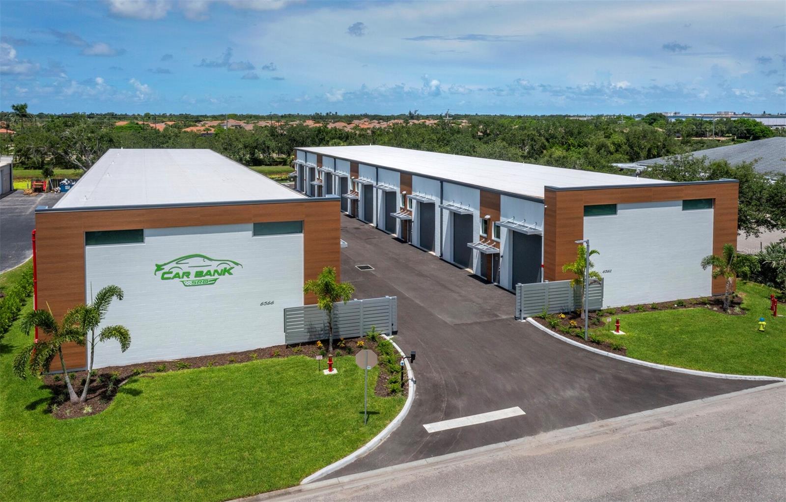Welcome to Car Bank SRQ – Where Your Passion Has a Home.
A new kind of luxury has arrived in Palmer Ranch, Sarasota. Car Bank SRQ isn’t just a garage—it's your private, customizable haven built for those who live and breathe the thrill of the road.
Whether you’re a car collector, motorsports enthusiast, RV adventurer, or boat owner, this is your chance to own more than just storage—it’s a lifestyle. Picture your personal warehouse: climate-controlled, ultra-secure, and fully private, with 24/7 gated access and just 18 exclusive units in the entire community. Unit #6 is a unique opportunity to join this exclusive community.
Each garage condominium is a blank canvas for your imagination—design a sleek showroom, create the ultimate race-prep space, or build your own two-story hangout with a mezzanine loft. Install a car lift, custom cabinetry, luxury flooring, or even a lounge area where you and fellow gearheads can swap stories over coffee. With 20' ceilings, there’s more than enough room to go big.
Need to freshen up your ride? Take advantage of the on-site car wash detail bay. Traveling in your RV? Use the convenient RV clean-out station before or after your next adventure.
Inside your condo:
Approx. 1,000 sq ft of space (42’D x 24’W), Massive 14’H x 12’W garage doors, A spacious half bathroom, HVAC, and utility sink, Transom windows on the front and rear of the unit, Fire sprinklers and monitored alarms for peace of mind, Low monthly HOA fees.
Located in the heart of Palmer Ranch, you’re minutes from dealership row, a short walk/bike ride to the scenic Legacy Trail, and just a quick drive to downtown Sarasota, Siesta Key, Casey Key, and I-75.
Whether you're housing a classic collection, building your dream garage lounge, prepping for track day, or storing your RV between epic road trips—Car Bank SRQ gives you the keys to do it all in style.