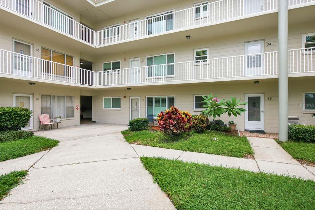 Photo of 2440 World Parkway Boulevard #34, Clearwater, FL 33763 (MLS # TB8531818)