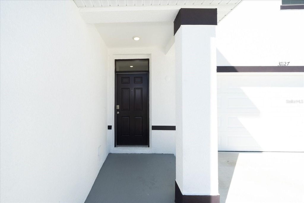 Photo of 31127 Penny Surf Loop, Wesley Chapel, FL 33545 (MLS # TB8406448)