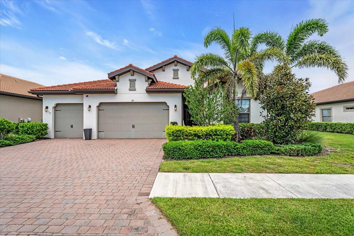 Welcome to your private lakefront oasis! This stunning 3-bedroom plus den, 3-car garage home is situated on an oversized lot in one of Venice’s most desirable gated communities, just 7 miles from Nokomis Beach and a short drive to Siesta Key. The home boasts exceptional indoor and outdoor living spaces, highlighted by breathtaking lake views, resort-style amenities, and over $100K in recent upgrades.
Enjoy an open-concept layout with soaring coffered and tray ceilings, crown molding, and wood-look tile throughout the main living areas. A spacious den with French doors offers the perfect space for a home office or flex room. The gourmet kitchen features newer stainless-steel appliances, soft-close cabinetry, under-cabinet lighting, a wine rack above the refrigerator, and custom wood shelving in the pantry.
The primary suite offers a luxurious retreat with a new dual glass-sink vanity, jetted tub, and walk-in shower. California closets are found throughout the home, and modern designer light fixtures have been thoughtfully added in every room. The split-bedroom layout ensures privacy for family and guests.
Step outside to an expansive screened lanai with a full outdoor kitchen—perfect for entertaining. The paver patio has been extended to 24' x 21' and includes a fire pit overlooking the large lake, ideal for enjoying Florida sunsets. The tropical backyard features professional landscape lighting, including uplighting on the foxtail palms. The front entryway has also been newly screened in. Storm drains have been added around the property to improve drainage and protect your investment year-round.
Additional features include: a 3-car garage, security system, high TV outlets throughout, and abundant natural light. Fishing, kayaking, and scenic lake views await just beyond your backyard with access to two connected lakes under Tuscan-style bridges.
Community amenities include an 8,000 sq ft clubhouse, infinity-edge pool, fitness center, tennis and pickleball courts, bocce, kayak launch, fire pit, playground, dog park, and catering kitchen—all for a low HOA fee ($792 a quarter). Conveniently located near I-75, Sarasota Memorial Hospital, Wellen Park, and top-rated dining and shopping.
Call today to schedule your private showing and experience Florida living at its finest.