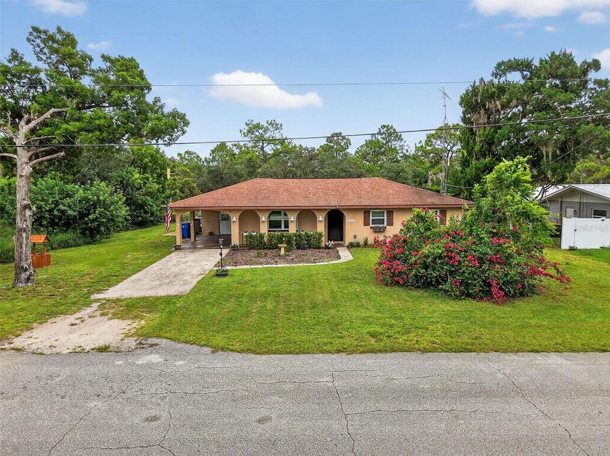 Welcome to 6404 Mat Tee Drive, a stunning retreat that blends style, comfort, and effortless living.

Set on a beautifully landscaped quarter-acre lot, this three-bedroom, two-bath ranch is packed with personality. From the inviting front porch to the screened-in saltwater pool and heated spa out back, every inch of this home is designed to help you relax and enjoy.

Inside, natural light fills the open layout, highlighting a mix of luxury vinyl and ceramic tile. The kitchen is both functional and stylish with modern appliances, a built-in water filtration system, and space for casual dining. A spacious Florida room offers over thirty feet of extra living space—ideal for entertaining, lounging, or creating your dream setup.

The primary suite features a built-in closet and en-suite bath, while two additional bedrooms provide comfort and flexibility. Smart home features, a full security system, energy-efficient windows, and a smart thermostat ensure peace of mind and year-round comfort.

With a private pool oasis, access to Lake Charlotte, and plenty of space to live and entertain, this home isn't just a place to live—it’s a place to love.