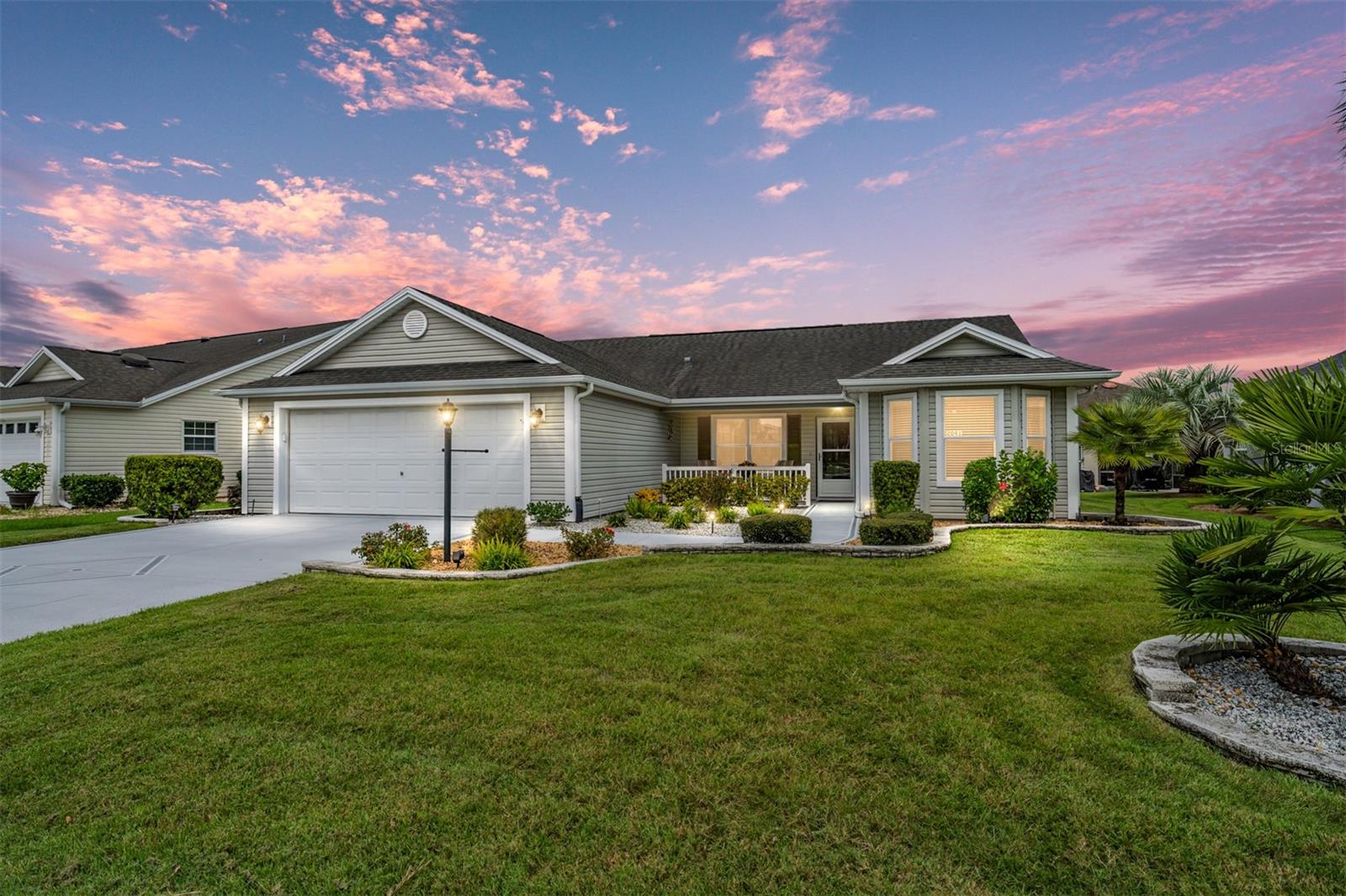 LOCATION!! LOCATION!! LOCATION!! This lovely BOUGAINVILLEA model, 3 bedroom/2 bath, 2 car garage, mostly TURNKEY, home located in the Village of Buttonwood, has to be seen to appreciate. It is located between 466 and 466A, perfectly situated between Lake Sumter Landing and Brownwood Square. You will truly be surrounded by all activities including Championship and Executive golf courses, restaurants, shopping, grocery stores, medical facilities and entertainment galore. Upon entering the home you will be impressed with high ceiling and bright light, in the living/dining room combination. Enter into the kitchen with a step-down bar, light cabinets and appliances. Most of the cabinets have pull-out shelving for easy access and convenient storage. The large carpeted Primary bedroom has an adjustable king size bed, and twin closets. The Primary bath has a tiled shower with doors, convenient double sinks, and private water closet. The 2 guest bedrooms have closets and a private bath w/ tub & shower. Off of the dining area is a muti-functional room that is bright and light to be used as you choose. The enclosed Lanai is a great place to enjoy your morning coffee and leads out doors to a nice size grill pad. The home has some window treatments throughout, including blinds. This move-in ready home is waiting for you. There are items that don't convey. Some are for staging only and most are identified. A HOME WARRANTY WILL BE GIVEN TO THE BUYER AT CLOSING.