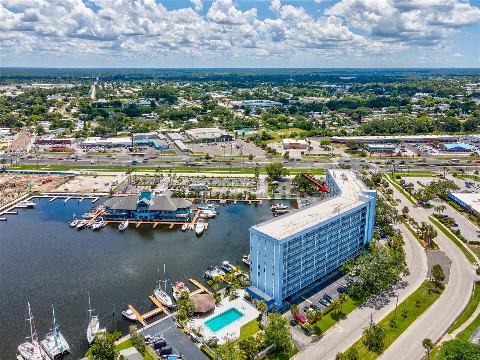 Welcome to this UPDATED and FULLY FURNISHED (1) bedroom and (1) bath condo located in the waterfront community of Gulf Harbors. This condo is an absolute MUST SEE with tasteful and barely used furnishings that grace the home ready for the new owners. This condo offers the ultimate in coastal living. It has an updated kitchen with gorgeous quartz counters. Wood look laminate flooring in the main living area and bedroom. The bathroom has been updated with a stunning glass barn door for the shower. The bedroom has ample room with 2 closets, 1 is a walk in. The condo features a magnificent water view overlooking the basin that dolphins, manatees and other sea life frequently visit. Pack your bags, bring your personal belongings and move in to this turn key home. Enjoy the community pool that's great for entertaining family and friends or just relaxing and taking it easy. Gulf Harbors offers a private member only beach with grills, bathrooms, picnic tables and pavilions where you can admire and enjoy the beautiful waters of the Gulf and the amazing sunsets. Dining, shopping and banking are close by. A lockable storage closet is located on the bottom floor of the complex where you can leave your outside activity equipment.