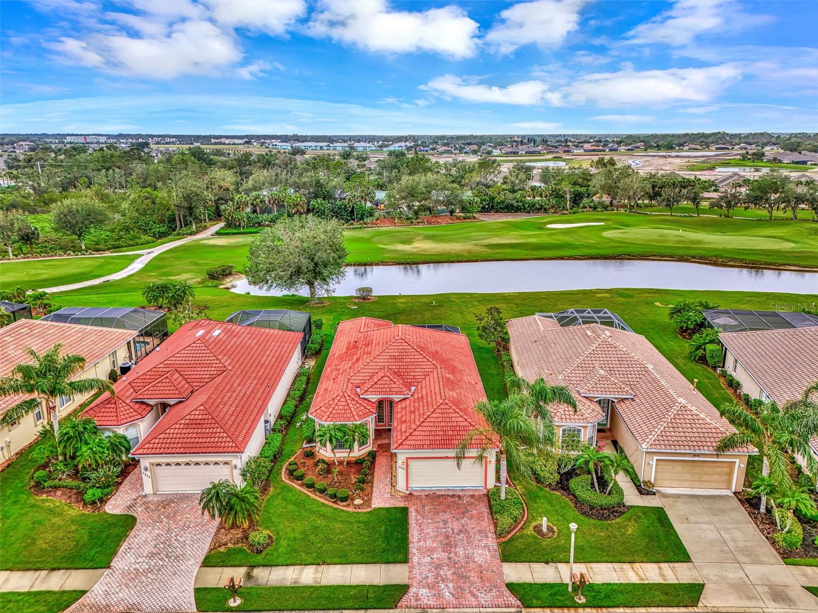 5633 WHISPERING OAKS DRIVE