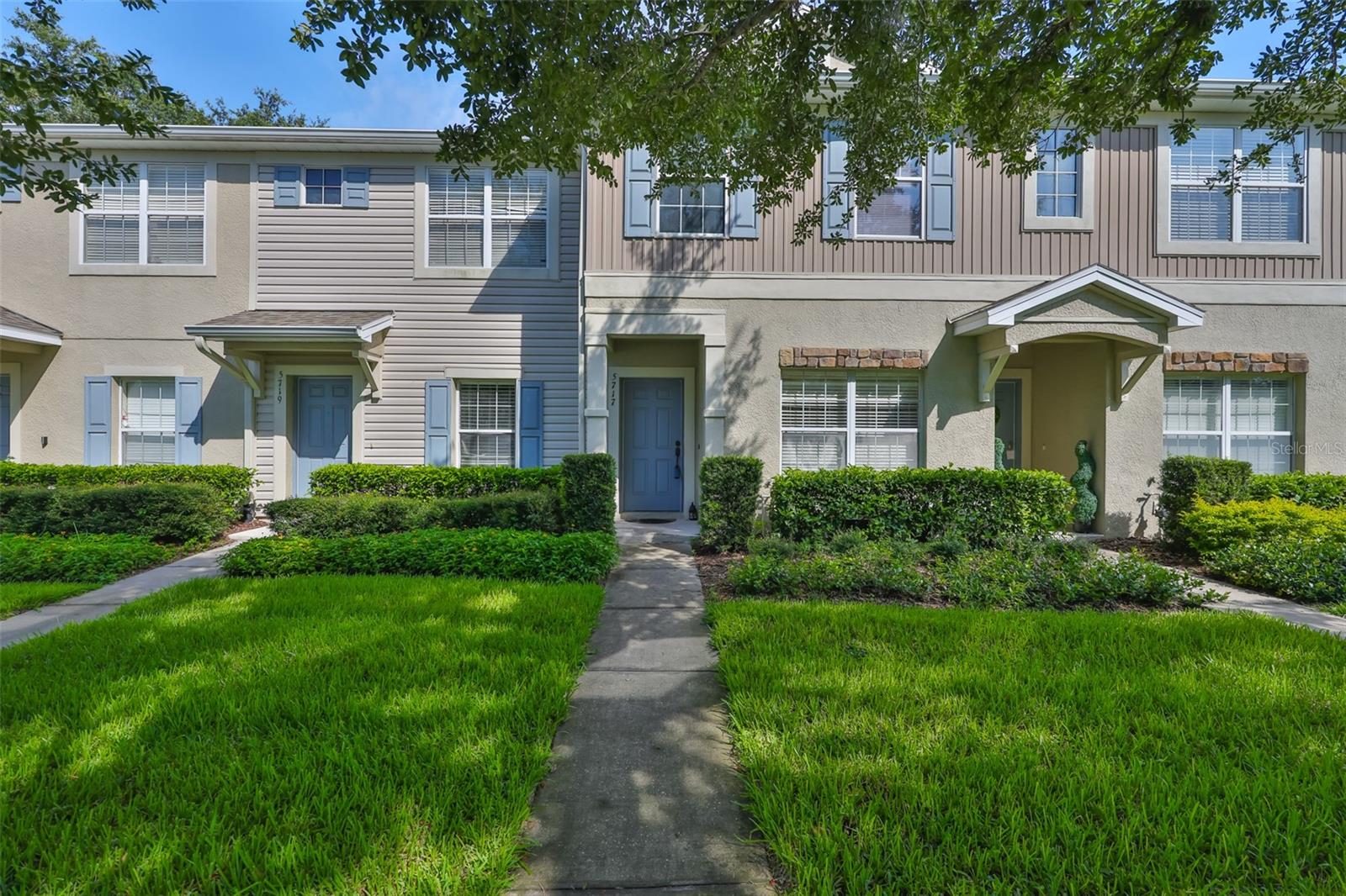 ATTENTION BUYERS! Welcome to this charming townhome located in the highly desirable gated community of Fishhawk Ranch—known for its top-rated schools and exceptional amenities. This 2-bedroom, 2.5-bath home is thoughtfully designed for both comfort and functionality. Upstairs, you'll find two spacious bedrooms, each with its own private en-suite bathroom. A half bathroom downstairs adds extra convenience for guests. The kitchen offers ample cabinet and counter space, ideal for cooking and entertaining. The dining area features a large window that fills the space with natural light, while the living room opens to a covered lanai with peaceful views of beautiful trees—bringing a touch of nature right into your home. Newer AC unit (2022) for added peace of mind! This gated community includes a pool and playground just steps away, and as a resident, you'll enjoy full access to all of Fishhawk Ranch’s top-tier amenities, including additional pools, parks, walking trails, baseball fields, and more. Centrally located near great dining, shopping, and entertainment options—this is a perfect place to call home!