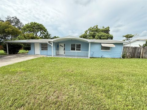 Photo of 4233 Darlington Road, Holiday, FL 34691 (MLS # TB8423235) Photo of 4233 Darlington Road, Holiday, FL 34691 (MLS # TB8423235)