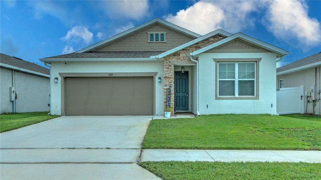 Photo of 1228 Mattie Pointe Boulevard, Auburndale, FL 33823 (MLS # S5154099)
