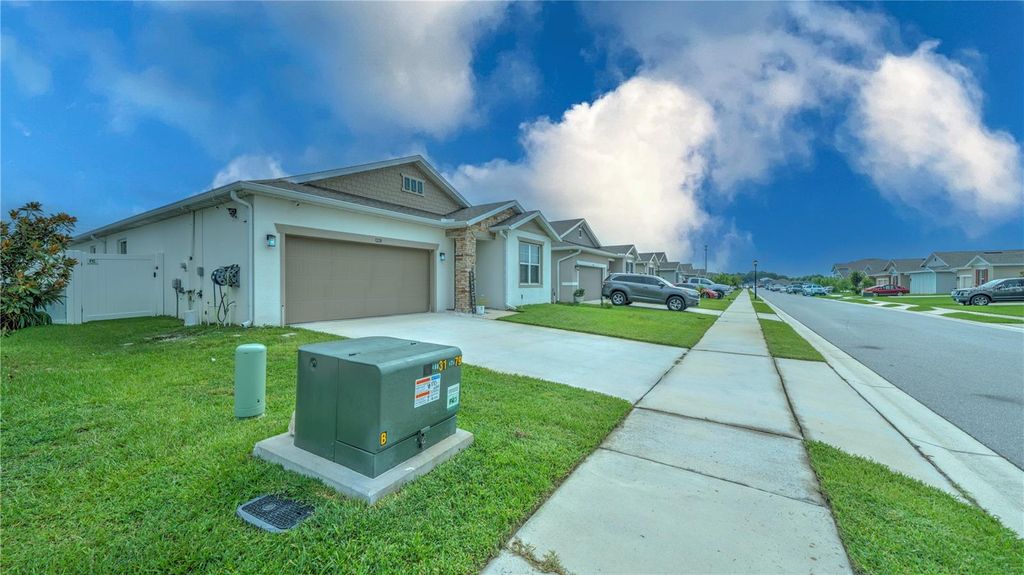Photo of 1228 Mattie Pointe Boulevard, Auburndale, FL 33823 (MLS # S5154099)
