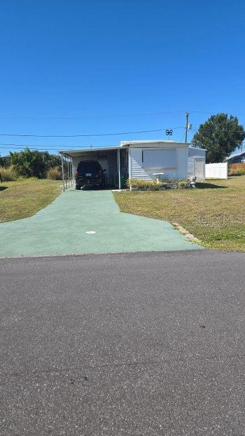 Photo of 1398 Ibis Drive, Englewood, FL 34224 (MLS # D6144594)