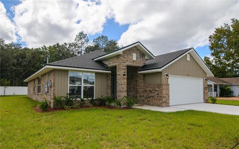 Photo of 88 Rae Drive, Palm Coast, FL 32164 (MLS # FC310550)