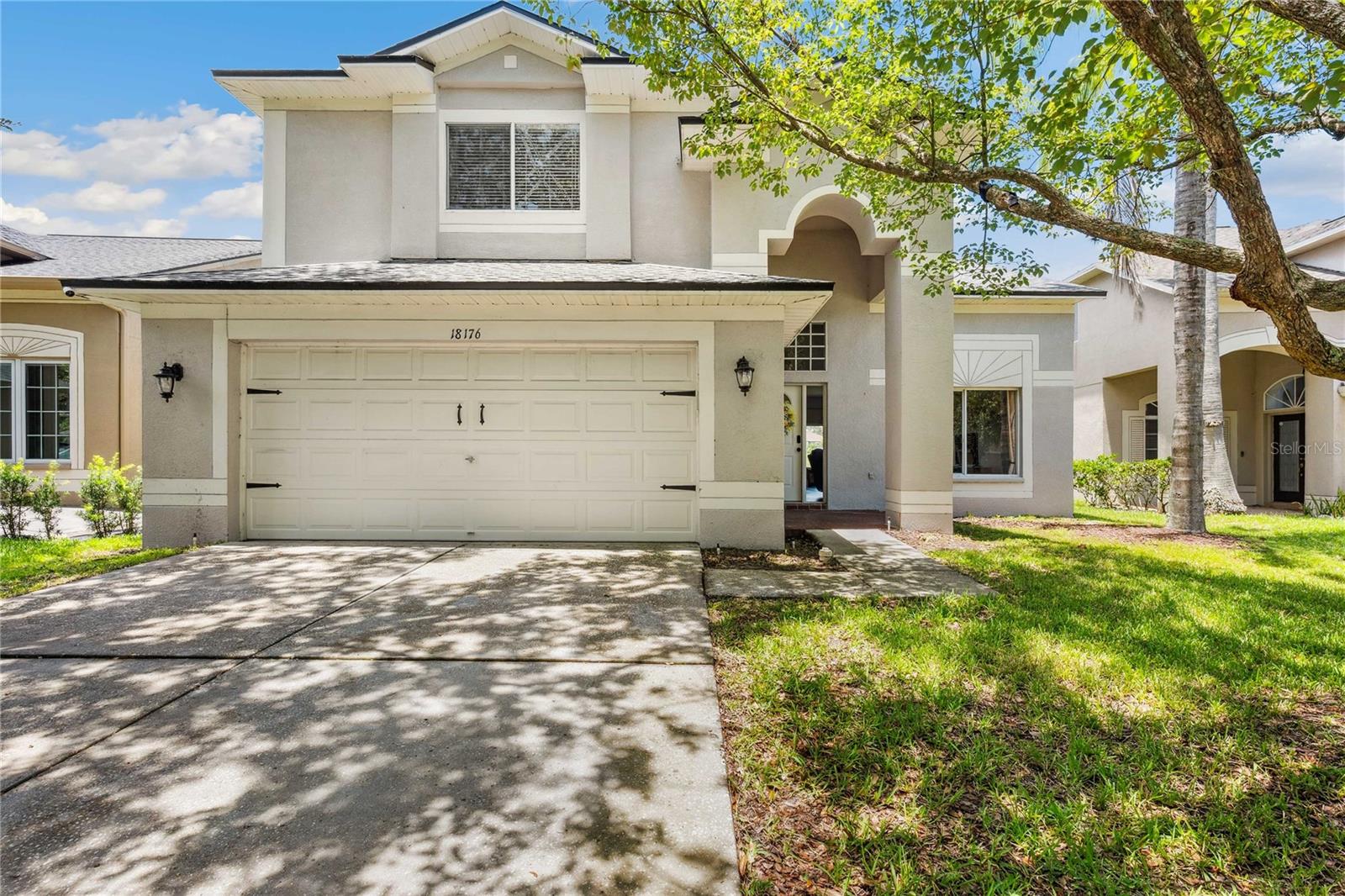 Welcome to your Move-In Ready home in the highly sought-after Heritage Isles Golf & Country Club offering resort-style living and golf course views with no backyard neighbors! This home is perfectly situated on the 14th hole of the golf course. Newer Roof installed in July of 2023. A/C replaced in 2015 and still in perfect working condition. The grand two-story entryway gives way to a bright and open view of the living area and second floor loft. The downstairs living areas were remodeled in 2020 with new vinyl flooring. The Gourmet Kitchen is a chef's dream with all newer appliances (2020). The home is adorned with both a spacious Family Room, Formal Living Room, Dining Room and an eat-in kitchen area. The Community features an 18-Hole Golf Course, Olympic Sized Pool w/ Slide, Clubhouse, Fitness Center, Restaurant, Tennis, Basketball & Playground. Close to schools, shops, restaurants, hospitals, and I-75. Whether you are searching for a primary residence, multi-generational home, or a warm-weather getaway, this home has it all! Don't miss this rare opportunity! Schedule your private tour today!