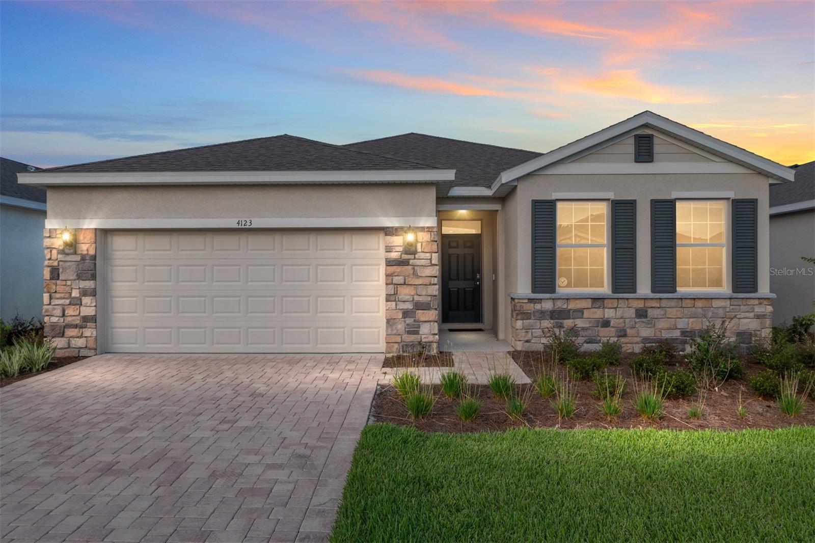 Immerse yourself in luxury living at this stunning 2024 built Delray model home featuring 4 bedrooms, 2 bathrooms and 2 car garage on a premium lot! Located within the prestigious, gated Ocala Preserve community, just 6 minutes from the World Equestrian Center! This immaculate home is perfect for families, offering a fully furnished haven in the non-age-restricted section. Move right in and enjoy a chef's kitchen boasting ample counter space, an eat-in kitchen with barstools, new stainless steel appliances, and a separate dining room area. The light and bright open floor plan creates a welcoming atmosphere. Relax in the luxurious master bedroom featuring a king-size bed, an en-suite bathroom featuring an upgraded glass enclosed shower, granite counter tops, large vanity with dual sinks and a spacious walk-in closet. A second bathroom and guest rooms are situated on the opposite side of the house for added privacy creating a perfect guest wing. Two additional bedrooms with plush queen beds and large closets, plus a fourth bedroom featuring two full-size beds, provide ample space for family or guests! A large, enclosed patio beckons you to relax and enjoy the beautiful backyard views, complete with the tranquility of a privacy wall so that you can enjoy your morning coffee, or a nightcap- in peace. Tasteful decor, high-end furniture, and upgraded finishes create an elegant ambiance throughout the home. A premium lot with upgraded landscaping further enhances the outdoor experience. The deep 2-car garage offers ample storage and is even golf cart ready! High-speed internet, utilities, and all community amenities are included in the rental rate. Enjoy access to golf, resort-style pools, tennis courts, dog park, 21 miles of serene walking trails, pickleball courts, a day spa, a fitness center, and more! Schedule your private tour today and discover your perfect family getaway at Ocala Preserve!
