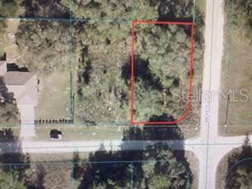 Corner lot in Dunnellon. Ready to be built and close to the electric power. Close to everything.