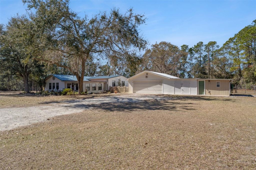 Photo of 21739 Shady Grove Road, Groveland, FL 34736 (MLS # O6381927)