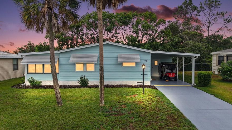 Discover Florida living at its best in this FABULOUS 2-bedroom, 2-bath home featuring an ENCLOSED LANAI with LUSH, MATURE, PRIVACY LANDSCAPING; SPACIOUS CARPORT; an INTERIOR LAUNDRY and STORAGE ROOM - perfectly nestled in the Village of Orange Blossom Gardens! - JUST MINUTES from Orange Blossom Hills Country Club, Pool, and Championship Golf Course; and Spanish Springs Town Square with shopping, dining, and live nightly entertainment! NO BOND or CDD! NEW ROOF (2025)! A PAINTED DRIVEWAY, SPACIOUS CARPORT, and French door entry welcome you in to the OPEN-CONCEPT layout showcasing VAULTED ceilings and BRAND-NEW light-wood LUXURY VINYL PLANK flooring that flows seamlessly throughout the ENTIRE HOME! The BRIGHT kitchen features coastal pale-blue cabinetry, WHITE countertops, STAINLESS steel appliances, and an EAT-IN breakfast bar. The adjoining dining and living rooms boast multiple windows that bathe the home in NATURAL LIGHT. Sliding glass doors open seamlessly from the living area to a STUNNING ENCLOSED LANAI, creating the perfect extension of the home’s living space. Designed for YEAR-ROUND ENJOYMENT, this retreat features EXPANSIVE WINDOWS showcasing PRIVATE outdoor views and a PAINTED FLOOR. Ideal for entertaining or quiet relaxation, the AMAZING ROOM includes direct access to a GRILLING PATIO, making indoor-outdoor living effortless. Beyond the patio, the PRIVATE REAR YARD features LUSH, MATURE LANDSCAPING, providing EXCEPTIONAL PRIVACY and a tranquil natural setting. Whether enjoying your morning coffee, evening sunsets, or hosting guests, this beautifully designed space offers the perfect blend of comfort, functionality, and indoor/outdoor charm! Back inside, the primary bedroom boasts a VAULTED CEILING, TWO windows, and a GENEROUS WALK-IN CLOSET. Its en-suite bathroom has coastal pale-blue corner cabinetry with a WHITE top, VESSEL sink, make-up vanity, and LINEN closet. A PRIVATE doorway connects a WALK-IN shower and water closet. The second bedroom also features a VAULTED CEILING and WALK-IN closet and offers the perfect space for additional sleeping space, a den, or a hobby room. The well-appointed second bathroom has a coastal pale-blue vanity with a WHITE top and VESSEL sink, tub and shower combination, and a hall LINEN closet. For added convenience, there’s also a BUILT-IN hallway DESK. CUSTOM BLINDS throughout the home. Adjacent to the SPACIOUS 20’x12’ CARPORT is a separate INDOOR UTILITY ROOM boasting a PAINTED floor, CONVENIENT LAUNDRY AREA, and PLENTY of space for STORAGE! The storage room can easily be converted into a golf cart garage for added flexibility and convenience. DON'T MISS YOUR OPPORTUNITY to make this WONDERFUL HOME YOUR OWN! *TURNKEY PACKAGE and 4-seater GOLF CART are available separately* The Village of Orange Blossom Gardens is IDEALLY LOCATED JUST MINUTES from Spanish Springs Town Square with shopping, dining, and live nightly entertainment! Close to Orange Blossom Country Club and Championship Golf Course; Hilltop and Silver Lake executive golf courses; Orange Blossom Country Club Pool with a waterfall and hot tub; Silver Lake Village Recreation Center; and Paradise Regional Recreation Center with an archery range, bocce, horseshoes, softball, and more! Also, ONLY MINUTES from Hwy 441/27 featuring an abundance of stores, restaurants, banks, and medical! PLEASE WATCH OUR WALKTHROUGH VIDEO of this FANTASTIC HOME  in a FABULOUS LOCATION and call today to schedule your Private Showing or Virtual Tour!