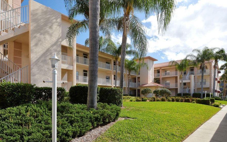 ANNUAL RENTAL AT STONEYBROOK CLUB SOUTH CIRCLE. LIVE THE COUNTRY CLUB LIFESTYLE - Perfect opportunity to experience the country club lifestyle in this ground-floor direct golf-view condo in Stoneybrook G&CC.   Condo is tastefully furnished with a King bed in the master bedroom with en suite bathroom featuring a beautifully tiled walk-in shower and quartz counters.  The second bedroom has a queen bed and is adjacent to the guest bathroom.  The kitchen is updated with quartz counters and stainless steel appliances, and the luxury vinyl flooring throughout makes for easy-care living.  There is one covered parking spot and a storage locker.  The community heated pool and tennis court are directly across the parking lot, and the clubhouse offers a large heated pool, a fitness center, and a full-service restaurant.  The community borders the Legacy walking and biking trail and is only a short distance from Siesta Key beach.  There is easy access to Costco, Publix, and many shops and restaurants.  Stoneybrook is a gated community and a great place to live and play.
