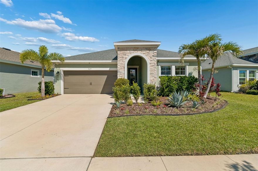 Welcome to this beautifully upgraded Northwood II floor plan by Cardel Homes located in the highly sought-after Waterset Community of Apollo Beach! Built in 2020, this meticulously maintained 4-bedroom, 2-bathroom home offers approximately 2,200 square feet of thoughtfully designed living space combining comfort, style, and functionality. From the moment you arrive, you’ll appreciate the charming curb appeal, and inviting entrance. Inside, the home showcases luxury wood flooring throughout, creating a seamless and elevated aesthetic. The gourmet kitchen is designed to impress with quartz countertops, stainless steel appliances, designer backsplash, and upgraded soft-close cabinetry and drawers.

The spacious living area features a stunning custom wall feature complete with built-in bookshelves and an electric fireplace, creating the perfect focal point for relaxing or entertaining. The open-concept layout flows effortlessly into the screened-in lanai and fully fenced backyard, providing the ideal indoor-outdoor Florida lifestyle. The owner’s suite offers a private retreat with generous space and a beautifully appointed en-suite bathroom, while the additional bedrooms provide flexibility for guests, family, or a home office setup. Living in Waterset means enjoying resort-style amenities that truly elevate everyday living. Residents have access to multiple resort-style pools and lap pools, tennis courts, pickleball courts, basketball courts, fitness centers, playgrounds, splash pads, dog parks, scenic walking trails, fishing docks, clubhouse amenities, community café, BBQ areas with hammocks, and countless community events throughout the year. Conveniently located near shopping, dining, schools, I-75, and just a short drive to Tampa, Sarasota, and Florida’s beautiful Gulf Coast beaches, this home offers the perfect blend of luxury, convenience, and community living. Schedule your private showing today!
