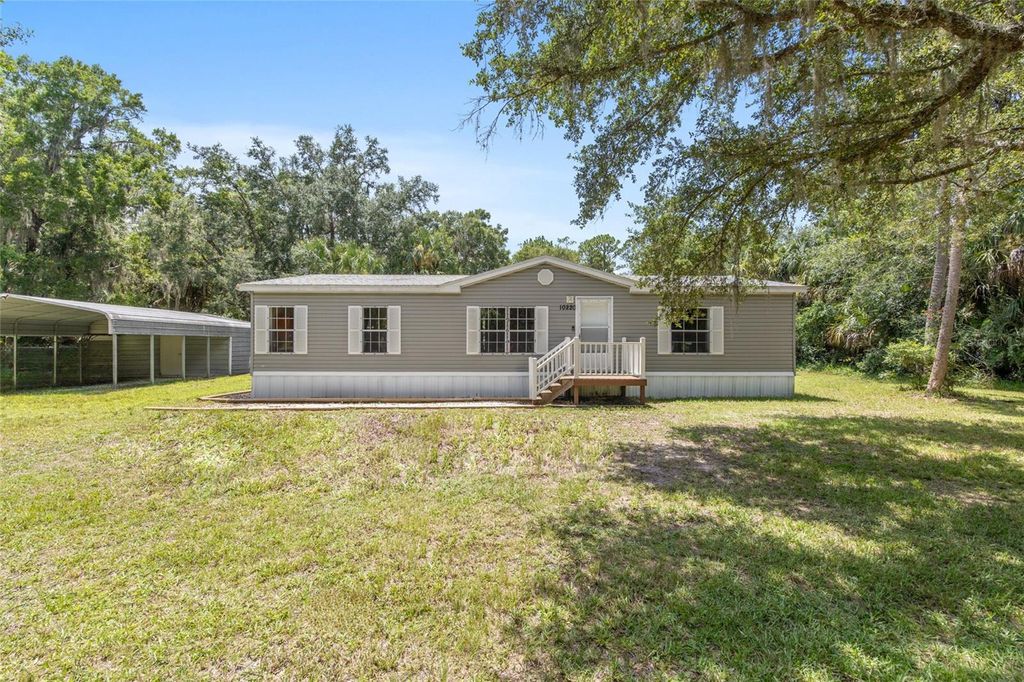 Photo of 10220 W Pamondeho Circle, Crystal River, FL 34428 (MLS # OM714717)