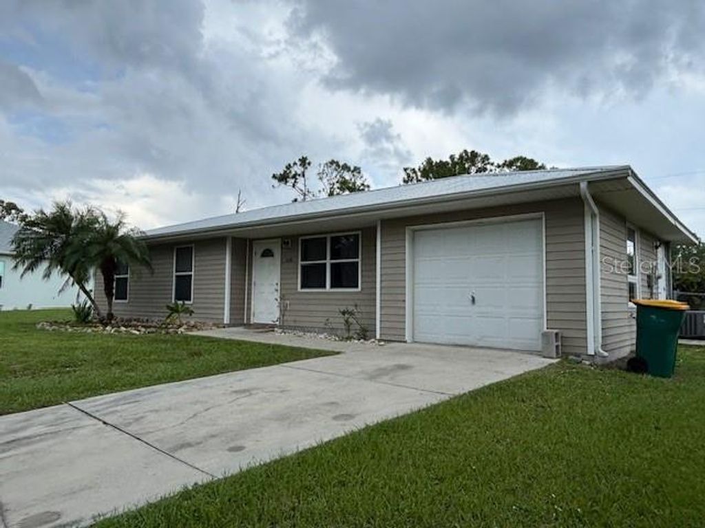 Photo of 5436 Stokes Street, Port Charlotte, FL 33981 (MLS # C7513760)