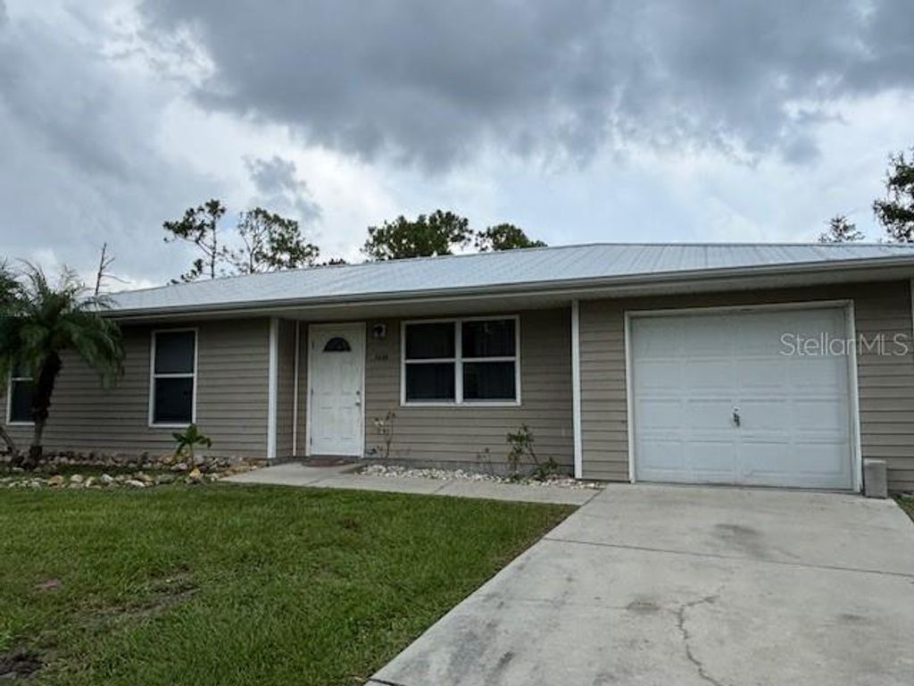 Photo of 5436 Stokes Street, Port Charlotte, FL 33981 (MLS # C7513760)