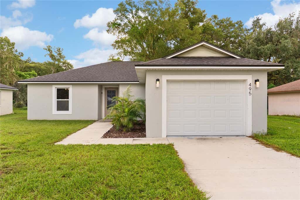 Photo of 495 S Oak Avenue, Fort Meade, FL 33841 (MLS # TB8537747)